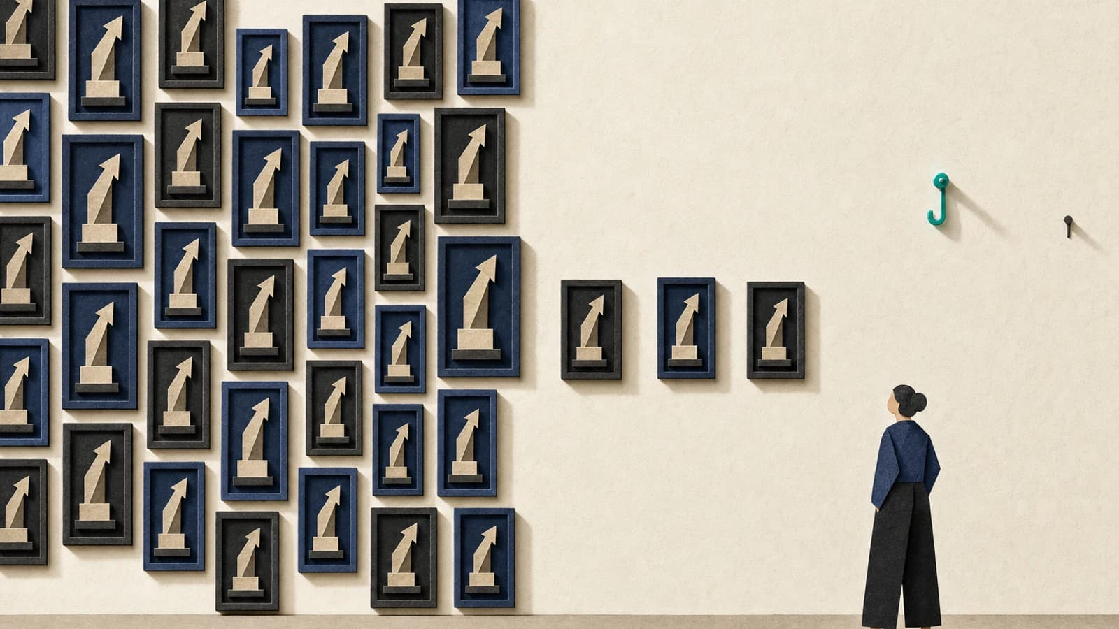 Techstars review: a gallery wall packed with trophy plaques on the left, three plaques in the middle, and a bare wall with one empty hook on the right